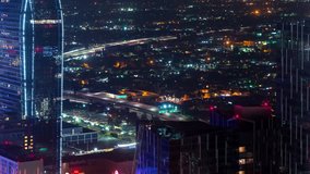 Time-lapse above Downtown Los Angeles at night looking at the expressway