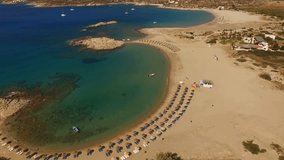 Aerial birds eye view video taken by drone of famous beach of Manganari, Ios island, Cyclades, Greece