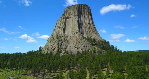 Devil's Tower With Blue Sky - Aerial Panning View - Wyoming, USA