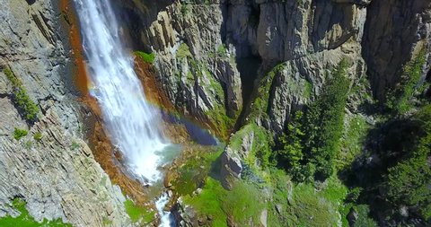Bucking Mule Falls in Summer - Wyoming, USA - Aerial Panning Footage Of Waterfall In Canyon
