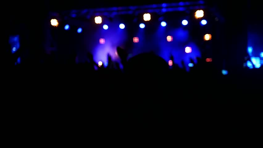 Young people dancing at the rep rock concert, slow-motion