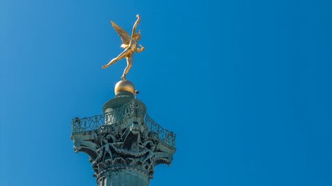 PARIS, FRANCE - CIRCA JULY 2017: The column and statue at the Place de la Bastille timelapse in Paris. Blue sky at summer day. Close up view