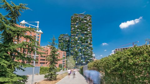 MILAN, ITALY - CIRCA JULY 2017: Bosco Verticale or Vertical Forest timelapse hyperlapse. It is a pair of two residential towers in the district of Porta Nuova, Milan. they host hundreds of trees and