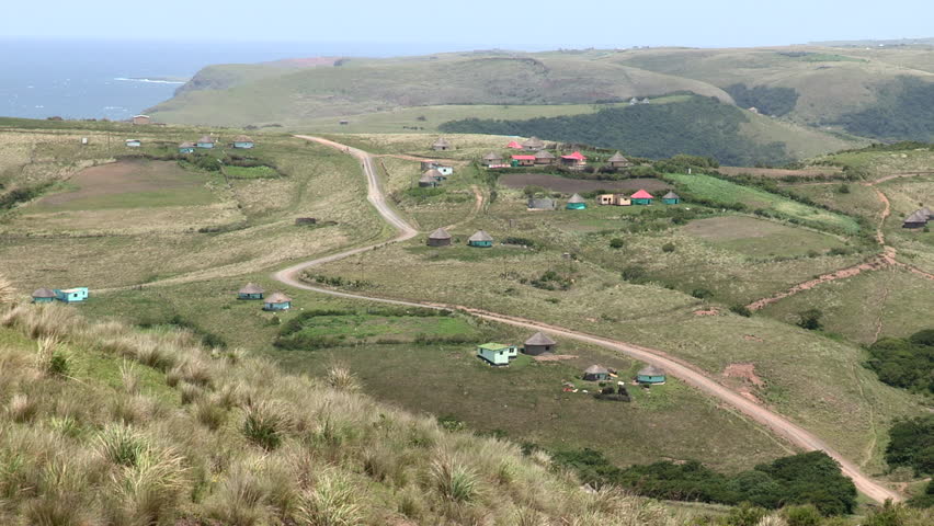 Wide view of the Transkei rural countryside will rolling green hill, winding