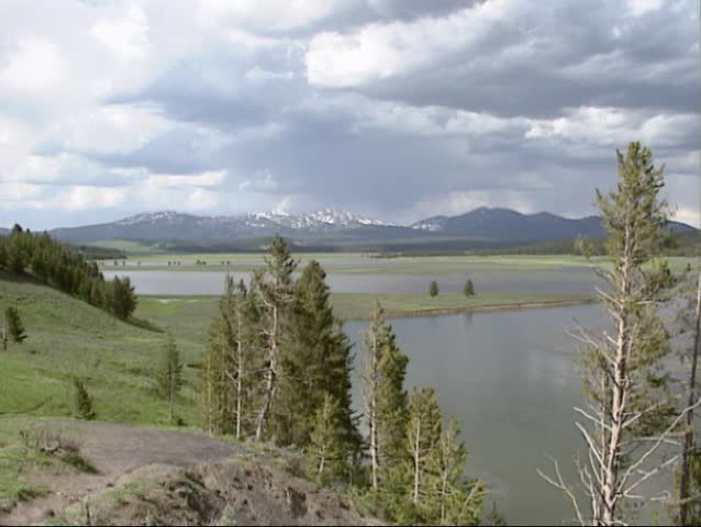 panoramic view of flooded Hayden Valley, Yellowstone National Park in spring. The Yellowstone River is considered to be one of the greatest trout streams of the world.