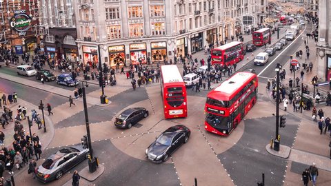 LONDON- NOVEMBER, 2017: Timelapse of busy Oxford Circus, an iconic London landmark where Oxford Road and Regent Street shopping areas meet. 