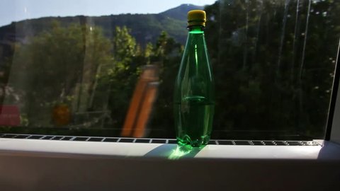 bottle in mineral water in train, tre roa