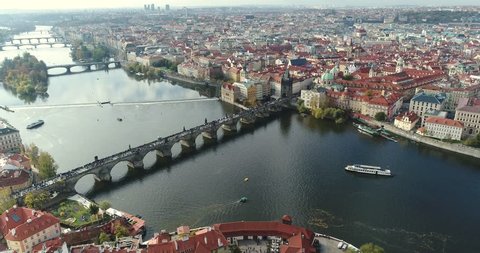 Panoramic view from above on the Prague Castle, aerial of the city, view from above on the cityscape of Prague, flight over the city, top view, Vltava River, Prague, October, 2017