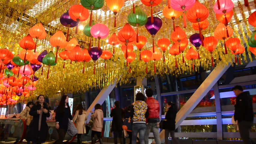 BEIJING - JAN 19: Colorful lanterns hang over corridor in Hangzhou Plaza for
