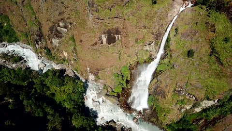 Waterfall in Himalayas range Nepal from Air view from drone