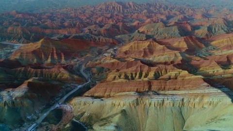 Aerial view on one of the most beautiful sections of Zhangye Danxia Rainbow Mountains showing striped pattern on sandstone hills.