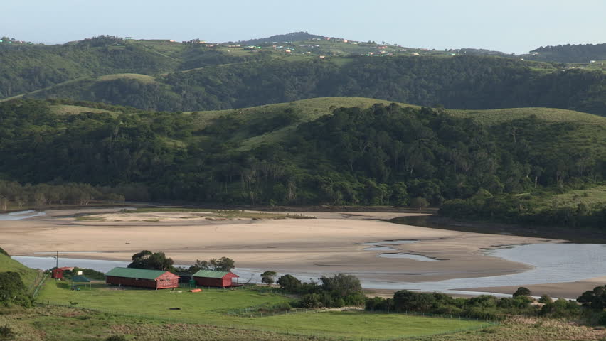 Valley, river and Xhosa huts in the Transkei.