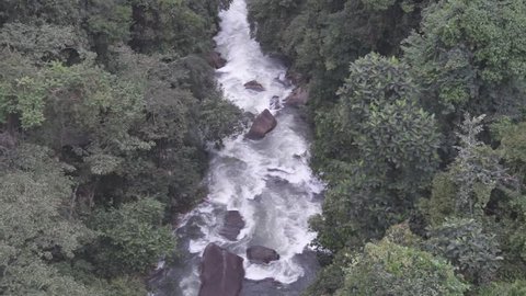 Real Time Aerial Footage of river stream in the jungle.Aerial footage of the waterfall in the national park.