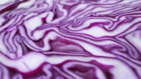 The texture of red cabbage closeup. Smooth camera motion. Cutting.