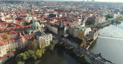 Panoramic view from above on the Prague Castle, aerial of the city, view from above on the cityscape of Prague, flight over the city, top view, Vltava River, Charles Bridge, Prague, October, 2017