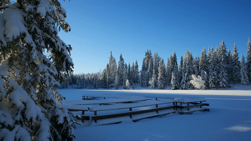 Frozen lake in sunshine time lapse