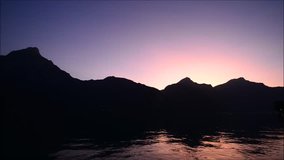 Sunset over the mountains of the Alps in Switzerland. Lake Lucerne.