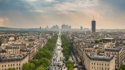 Paris city skyline timelapse at La Defrense and Champs Elysees view from Arc de Triomphe, Paris, France 4K Time lapse