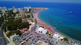 Aerial birds eye view video taken by drone of Rhodes island town Mandraki port a popular summer tourist destination, Dodecanese, Aegean, Greece