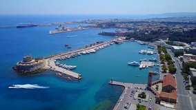 Aerial birds eye view video taken by drone of Rhodes island town medieval fortress of Saint Nicholas, Dodecanese, Aegean, Greece