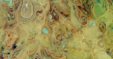 Very high-altitude overflight aerial of Tanezrouft Basin, in the Algerian Sahara Desert. Elements of this image furnished by NASA