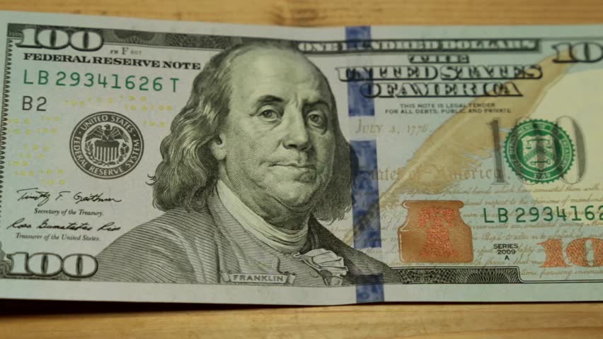 American dollars and bitcoin. | Shutterstock HD Video #33505309