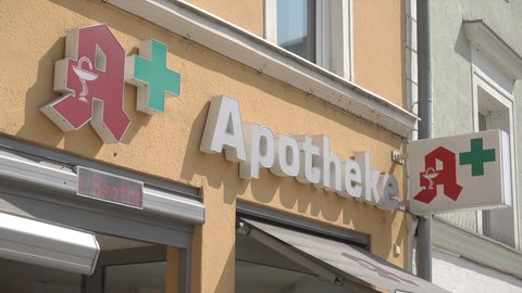 PASSAU, BAVARIA/GERMANY - SEPTEMBER 09, 2017: Apotheke or pharmacy logo. German Apotheken also prescribe herbal and homeopathic supplements.