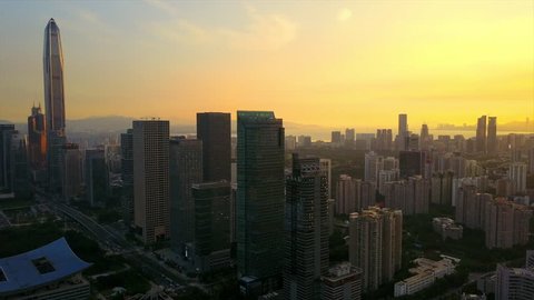 sunset time shenzhen downtown construction traffic road aerial panorama 4k china