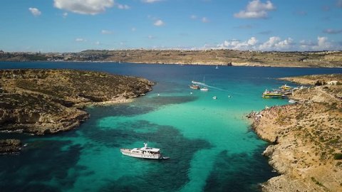 4k aerial drone footage - The Blue Lagoon, Mediterranean Sea.  Comino Island, Malta.