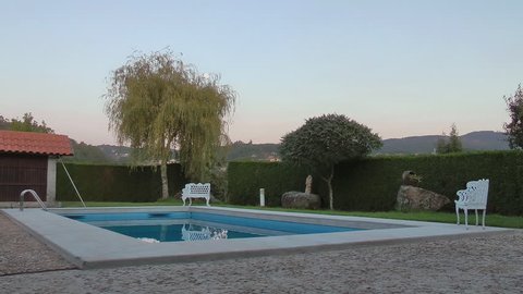 Swimming pool garden sunset