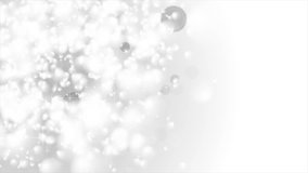 White shiny bokeh abstract luminous particles motion design. Seamless looping. Video animation Ultra HD 4K 3840x2160