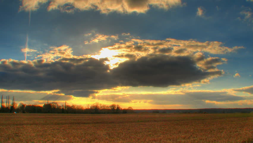Sunset over corn fields, HD time lapse clip, high dynamic range imaging
