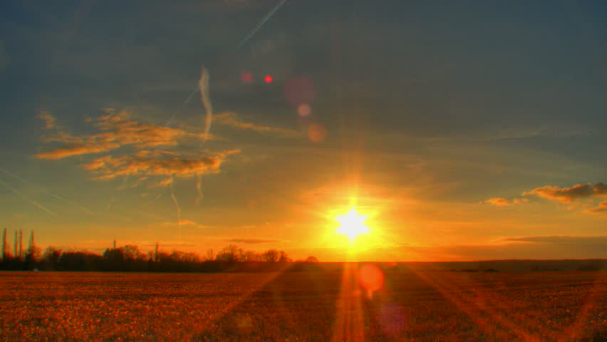 Sunset over corn fields, HD time lapse clip, high dynamic range imaging