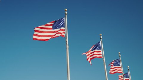 many american usa flags fluttering wind Stock Footage Video (100% ...