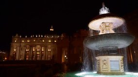 October 2015: Night video from iconic fountain of Saint Peter Basilica in city of Vatican, Rome, Italy      