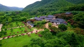 Aerial video of korea temple is located in the midst of nature, South korea.