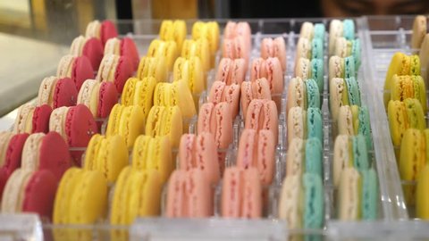 Close Up Colorful Macarons Dessert In Bakery Shop. 4K. 