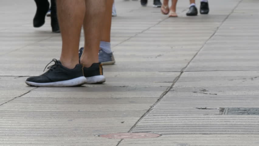People pedestrians walk cross big city. The footsteps of a crowd of people go on business in the metropolis | Shutterstock HD Video #33586621