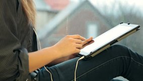 Teenager Girl Using Digital Tablet, Listening Music  