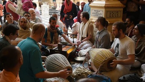 VRINDAVAN, INDIA 11 MARCH 2017 : Hare Krishna playing Kirtan chants in the interior of ISKCON temple Krishna Balarama in Vrndavana, Vrindavan is considered to be a holy place.