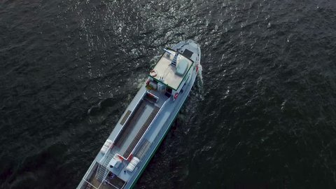 Aerial of boat sailing into Stockholm, Sweden
