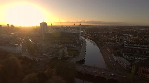 Aerial view of Cardiff city centre at sunrise.