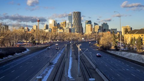 CALGARY, CANADA - NOV 26: Timelpase of Calgary's skyline during winter on November 26, 2017 in Calgary Alberta. Calgary's downtown has many buildings. 