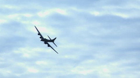 September 29 2017: Southport Air Show  - B17 bomber 4k  banking over in clouds
