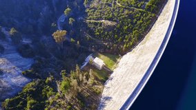 Spring 2016: Aerial bird's eye view video taken by drone of lake and Dam with beautiful nature