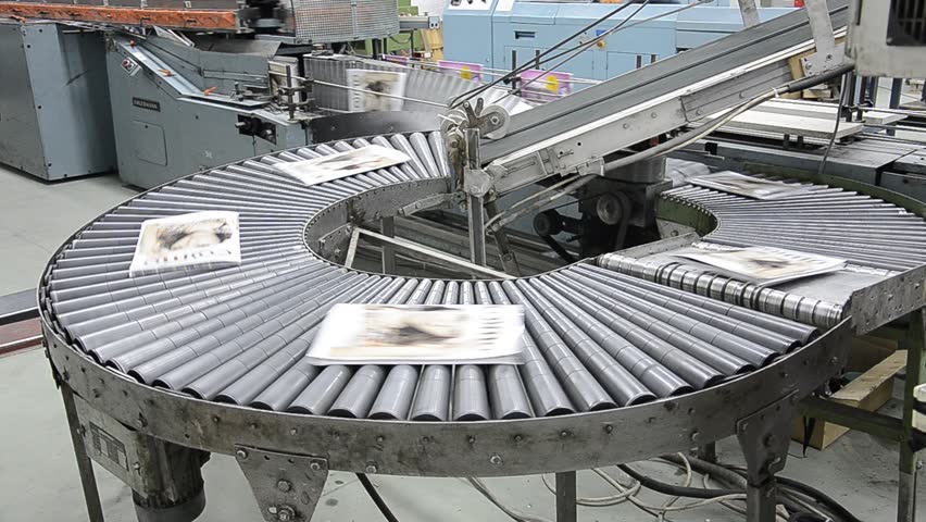 book and magazine perfect bound production line into print plant. Assembly line