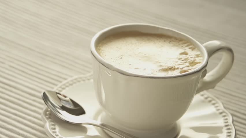 milkdrops splashing in coffee slow motion (240fps)