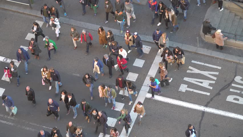 Gran Via, Madrid, Spain - November 2017: Pedestrians crossing the Gran Via street  Royalty-Free Stock Footage #33637426