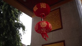 HD video Chinese red lanterns. Illuminate lamps to celebrate Chinese New Year.