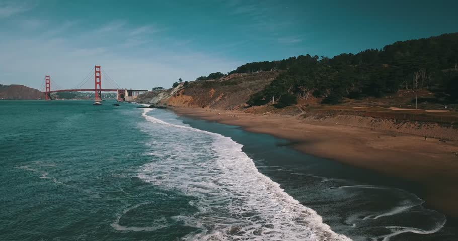 Aerial View of Golden Gate Bridge and Baker Beach, over Pacific Ocean